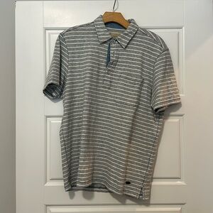 True Grit polo.  Size Mx. grey and white stripe